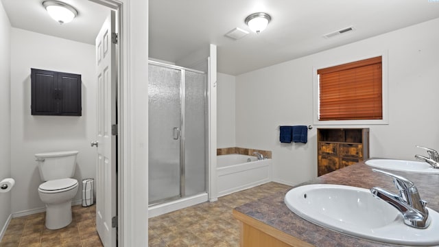 5706 Wrigley Dr, Pasco, WA 99301 - full bathroom featuring a stall shower, toilet, a bath, and baseboards
