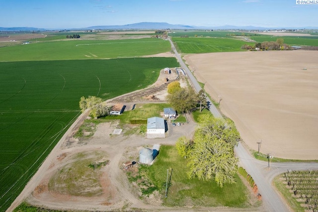 drone / aerial view featuring a mountain view and a rural view