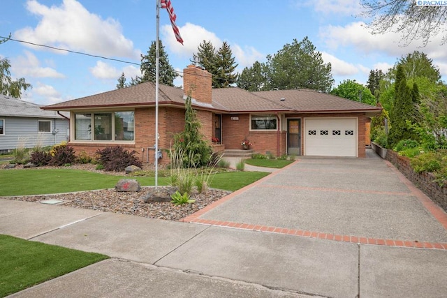 407 Steptoe St, Colton, WA 99113 - ranch-style house featuring a garage, driveway, a chimney, a front yard, and brick siding