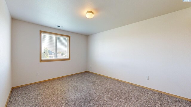4613 Atlanta Ln, Pasco, WA 99301 - carpeted spare room with baseboards