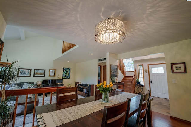 2929 S Ledbetter Pl, Kennewick, WA 99337 - dining room featuring stairway, a chandelier, and wood finished floors