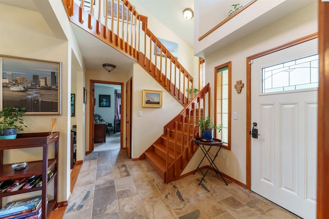 2929 S Ledbetter Pl, Kennewick, WA 99337 - foyer entrance with stone finish floors, stairs, and a high ceiling