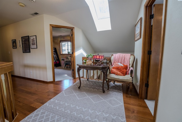 2929 S Ledbetter Pl, Kennewick, WA 99337 - living area with wood finished floors, a skylight, and lofted ceiling
