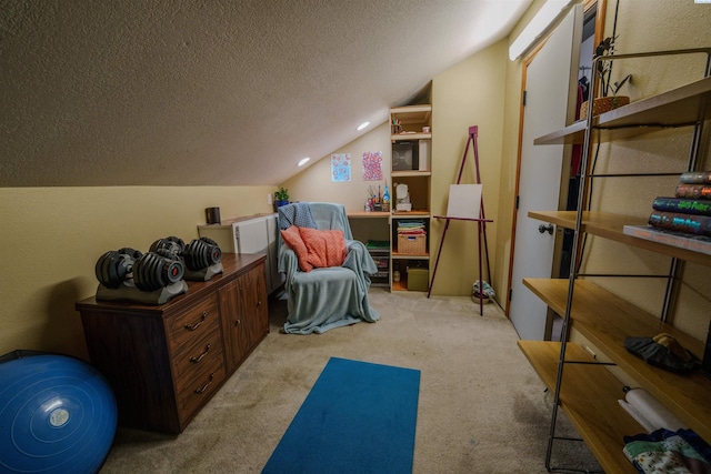 2929 S Ledbetter Pl, Kennewick, WA 99337 - workout area with vaulted ceiling, carpet floors, and a textured ceiling