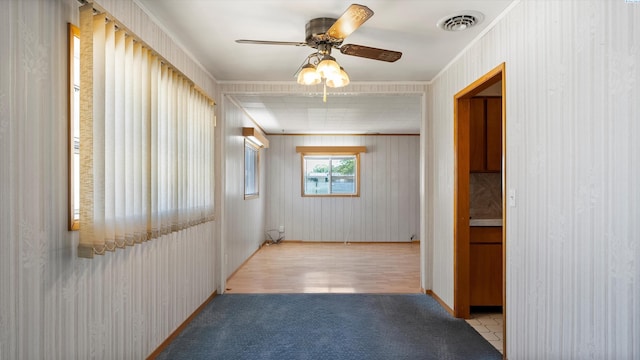 2111 W 20th Ave, Kennewick, WA 99337 - corridor featuring crown molding, carpet flooring, and wood finished floors