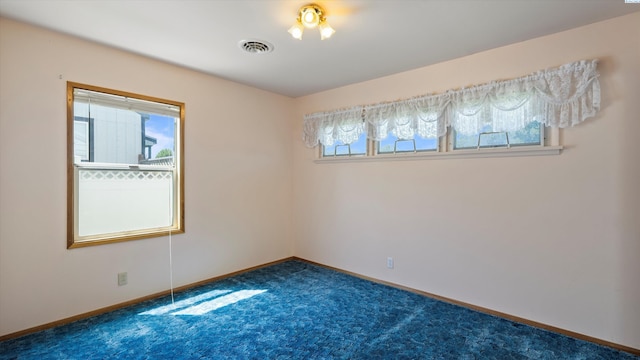 2111 W 20th Ave, Kennewick, WA 99337 - spare room with carpet flooring and plenty of natural light