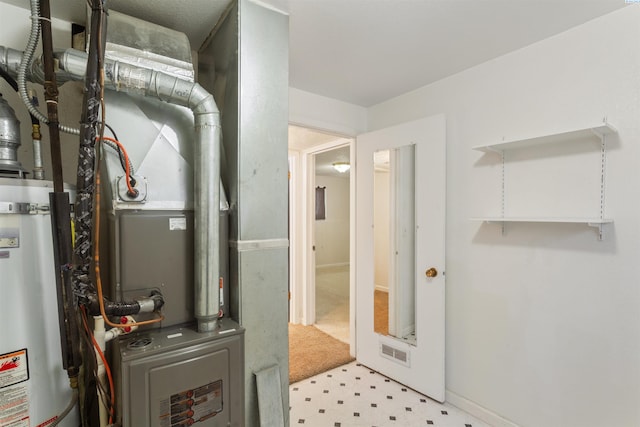 1621 S Fruitland St, Kennewick, WA 99337 - utilities featuring strapped water heater and heating unit
