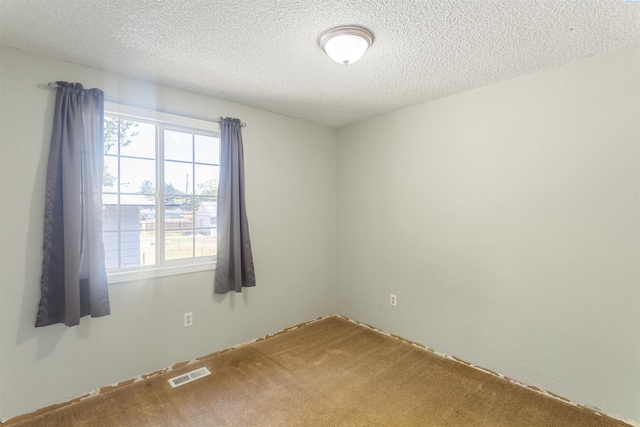 1621 S Fruitland St, Kennewick, WA 99337 - unfurnished room with carpet flooring and a textured ceiling