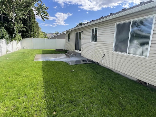 view of yard with a patio and entry steps