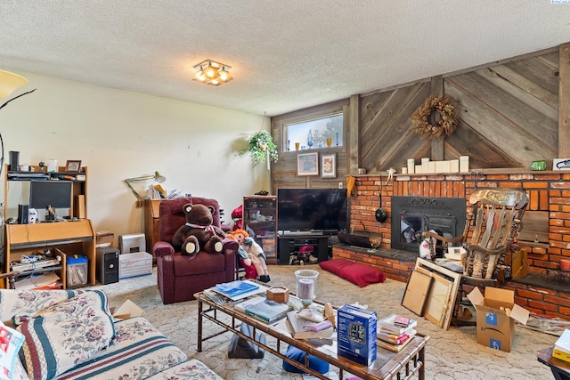 5820 W Park Pl, Pasco, WA 99301 - carpeted living area with a textured ceiling and a fireplace