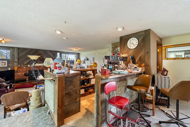 5820 W Park Pl, Pasco, WA 99301 - indoor dry bar with wooden walls, a textured ceiling, and healthy amount of natural light
