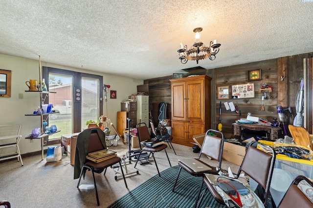 5820 W Park Pl, Pasco, WA 99301 - home office featuring a textured ceiling, wood walls, light colored carpet, and a chandelier