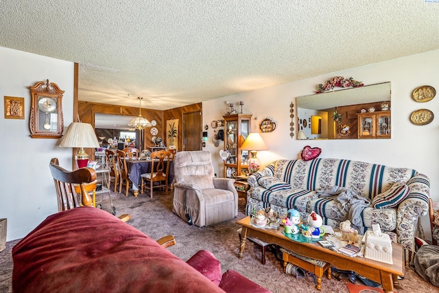 5820 W Park Pl, Pasco, WA 99301 - living area with a textured ceiling, carpet flooring, and a chandelier