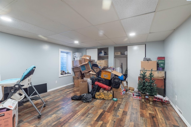625 SW Dawnview Ct, Pullman, WA 99163 - rec room with wood finished floors, a paneled ceiling, and baseboards