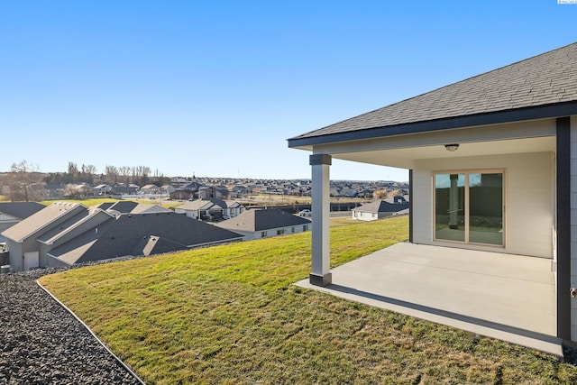 6435 W 30th Pl, Kennewick, WA 99338 - view of grassy yard featuring a residential view and a patio area