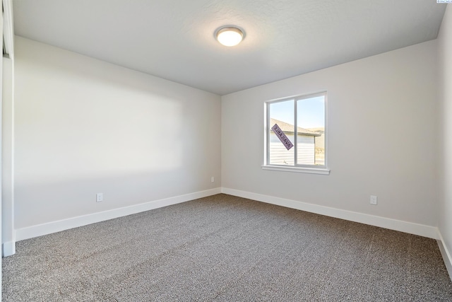 6435 W 30th Pl, Kennewick, WA 99338 - carpeted empty room featuring baseboards