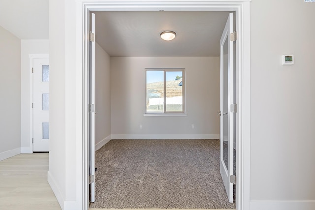 6435 W 30th Pl, Kennewick, WA 99338 - empty room featuring baseboards and light colored carpet