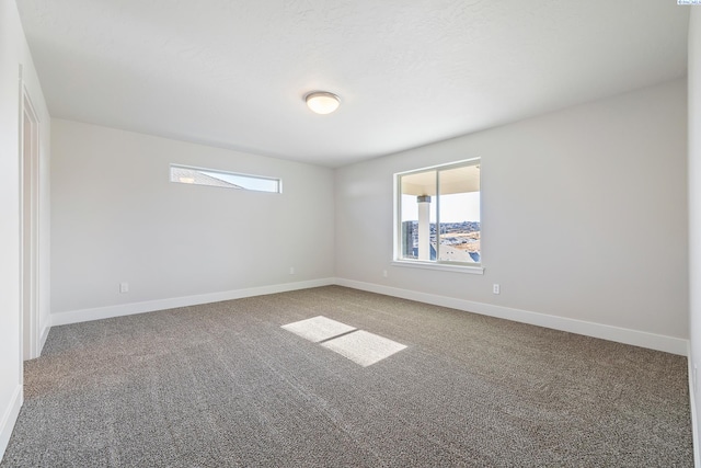 6435 W 30th Pl, Kennewick, WA 99338 - carpeted empty room with baseboards