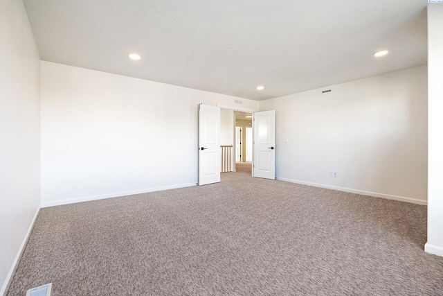 empty room with carpet floors