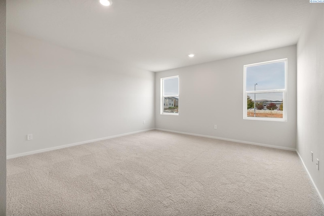704 S Zeelar St, Kennewick, WA 99336 - empty room featuring light carpet, recessed lighting, and baseboards