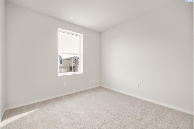 704 S Zeelar St, Kennewick, WA 99336 - carpeted empty room featuring baseboards