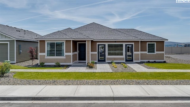 view of front of home with a front yard