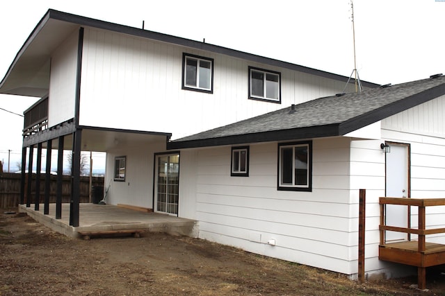 back of house with a patio area