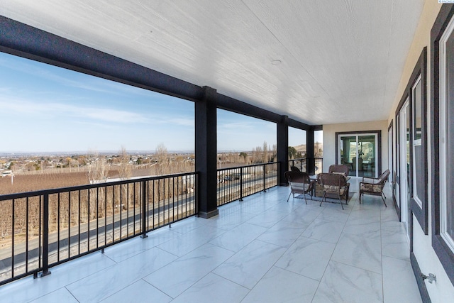 sunroom with marble finish floor