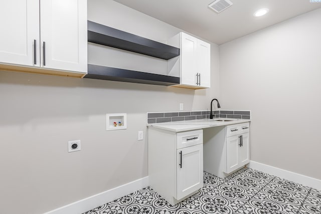 laundry area with washer hookup, hookup for an electric dryer, visible vents, baseboards, and recessed lighting