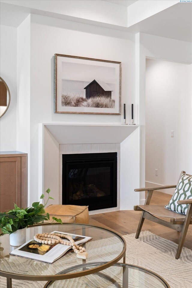 670 Cortona Unit 39, Richland, WA 99352 - living area featuring a tile fireplace and baseboards