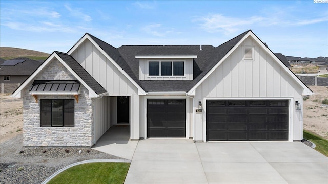 670 Cortona Unit 39, Richland, WA 99352 - modern farmhouse with board and batten siding, a shingled roof, driveway, and stone siding