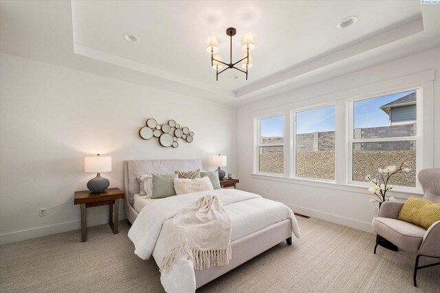 670 Cortona Unit 39, Richland, WA 99352 - carpeted bedroom with a raised ceiling, a chandelier, baseboards, and recessed lighting
