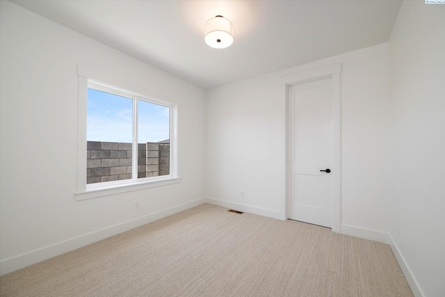 670 Cortona Unit 39, Richland, WA 99352 - spare room with light carpet and baseboards
