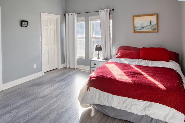 bedroom with light hardwood / wood-style flooring