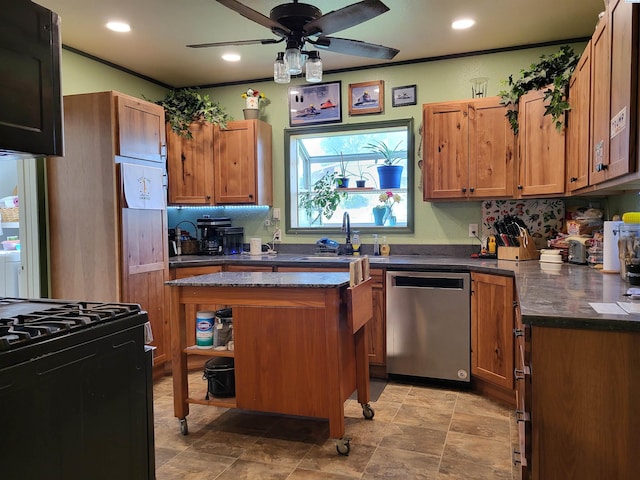 132 2nd St, Diamond, WA 99111 - kitchen with stainless steel dishwasher, black range with gas stovetop, ceiling fan, recessed lighting, and brown cabinets