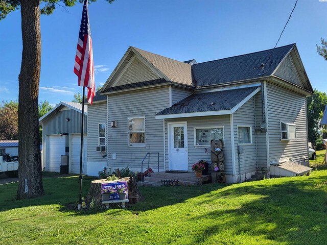 132 2nd St, Diamond, WA 99111 - rear view of house with a yard, roof with shingles, and cooling unit