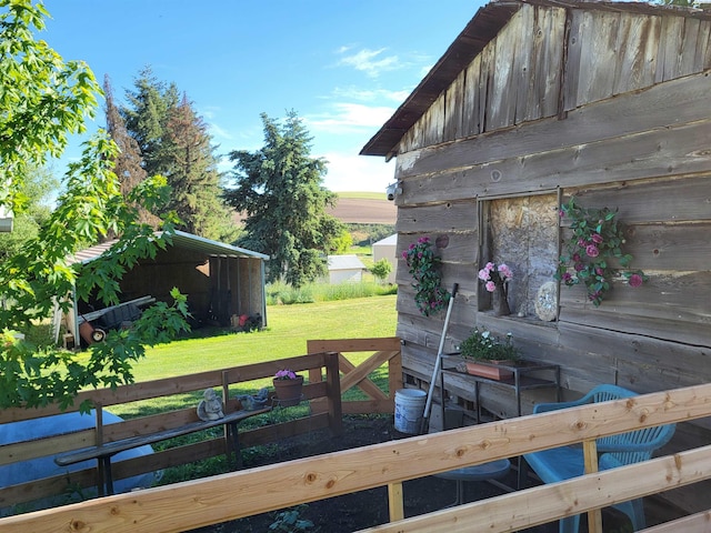 132 2nd St, Diamond, WA 99111 - wooden terrace with a lawn