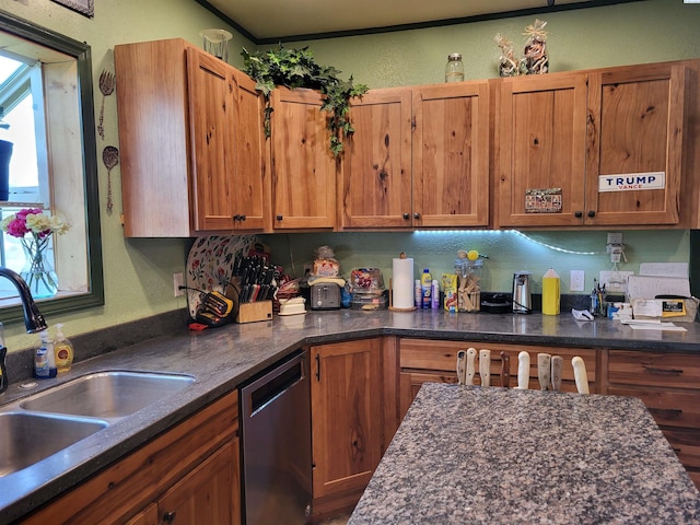 132 2nd St, Diamond, WA 99111 - kitchen with dishwasher, healthy amount of natural light, brown cabinetry, and dark stone counters