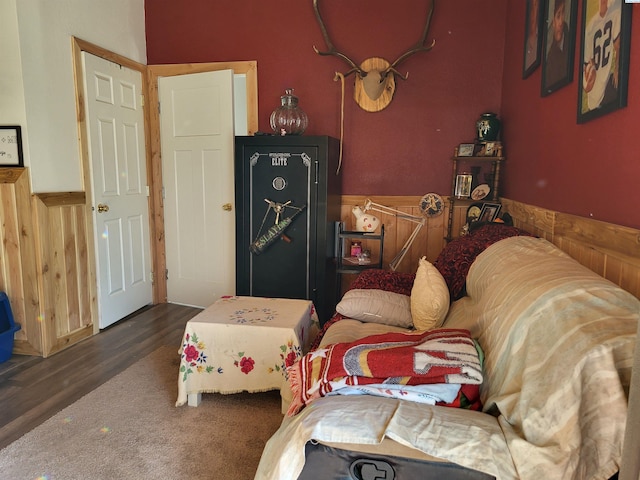132 2nd St, Diamond, WA 99111 - sitting room featuring a wainscoted wall, wood walls, and wood finished floors