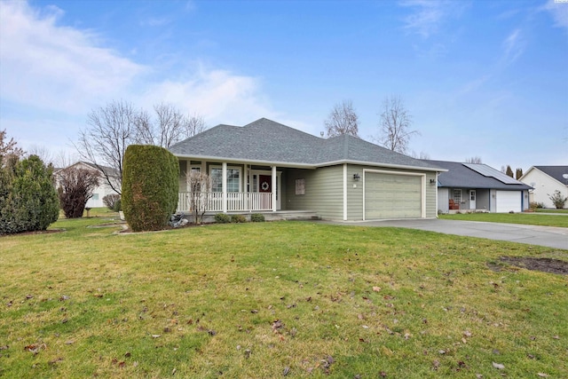 ranch-style home featuring a garage, covered porch, and a front lawn