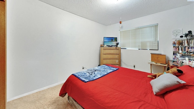 1735 NE Wheatland Dr, Pullman, WA 99163 - carpeted bedroom featuring baseboards and a textured ceiling
