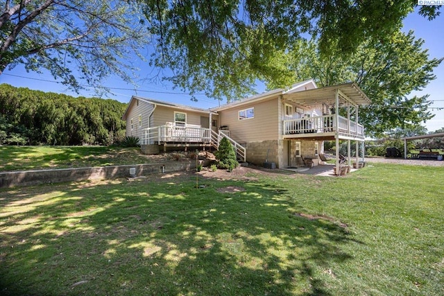 805 Babs Ave, Benton City, WA 99320 - rear view of property with a deck, a lawn, and stairway