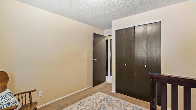 4745 W Robin Ct, West Richland, WA 99353 - carpeted bedroom with a textured ceiling and a closet