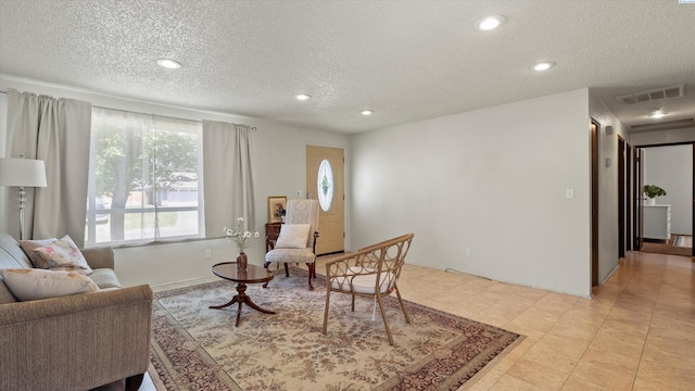 4745 W Robin Ct, West Richland, WA 99353 - living room featuring a textured ceiling and recessed lighting