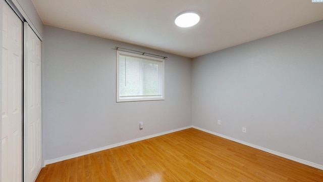90 NW Thomas St Unit B, Pullman, WA 99163 - unfurnished bedroom featuring light wood finished floors, a closet, and baseboards