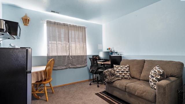 5019 Cambridge Ln, Pasco, WA 99301 - living area featuring a desk and carpet flooring