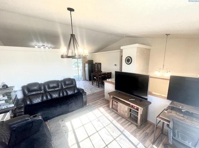 5019 Cambridge Ln, Pasco, WA 99301 - living area with light wood-style floors, a chandelier, and vaulted ceiling