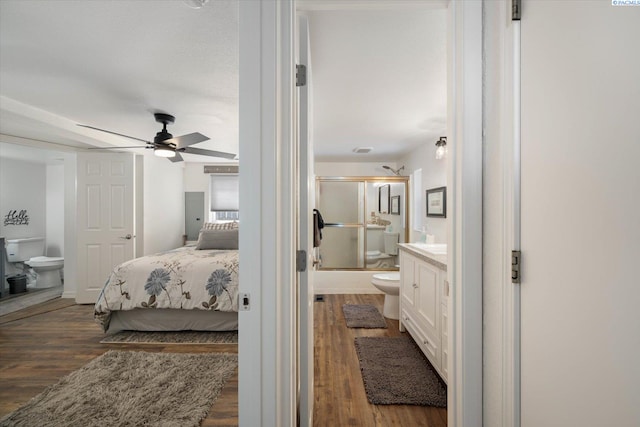 518 Wright Ave, Richland, WA 99352 - bedroom featuring dark wood finished floors and connected bathroom