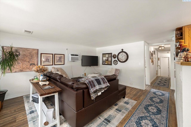 518 Wright Ave, Richland, WA 99352 - living room with wood finished floors, baseboards, and a wall unit AC