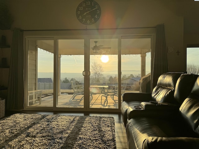 doorway to outside with ceiling fan